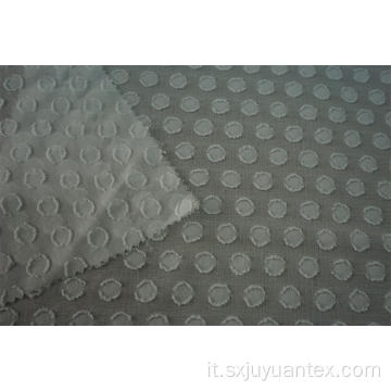 Tessuto jacquard con clip in poliestere a pois bruciato